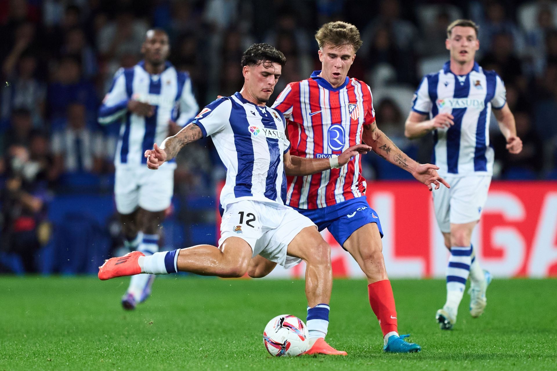 Who is favored in posiciones de real sociedad contra atlético de madrid？ (Expert predictions on La Liga rankings!)